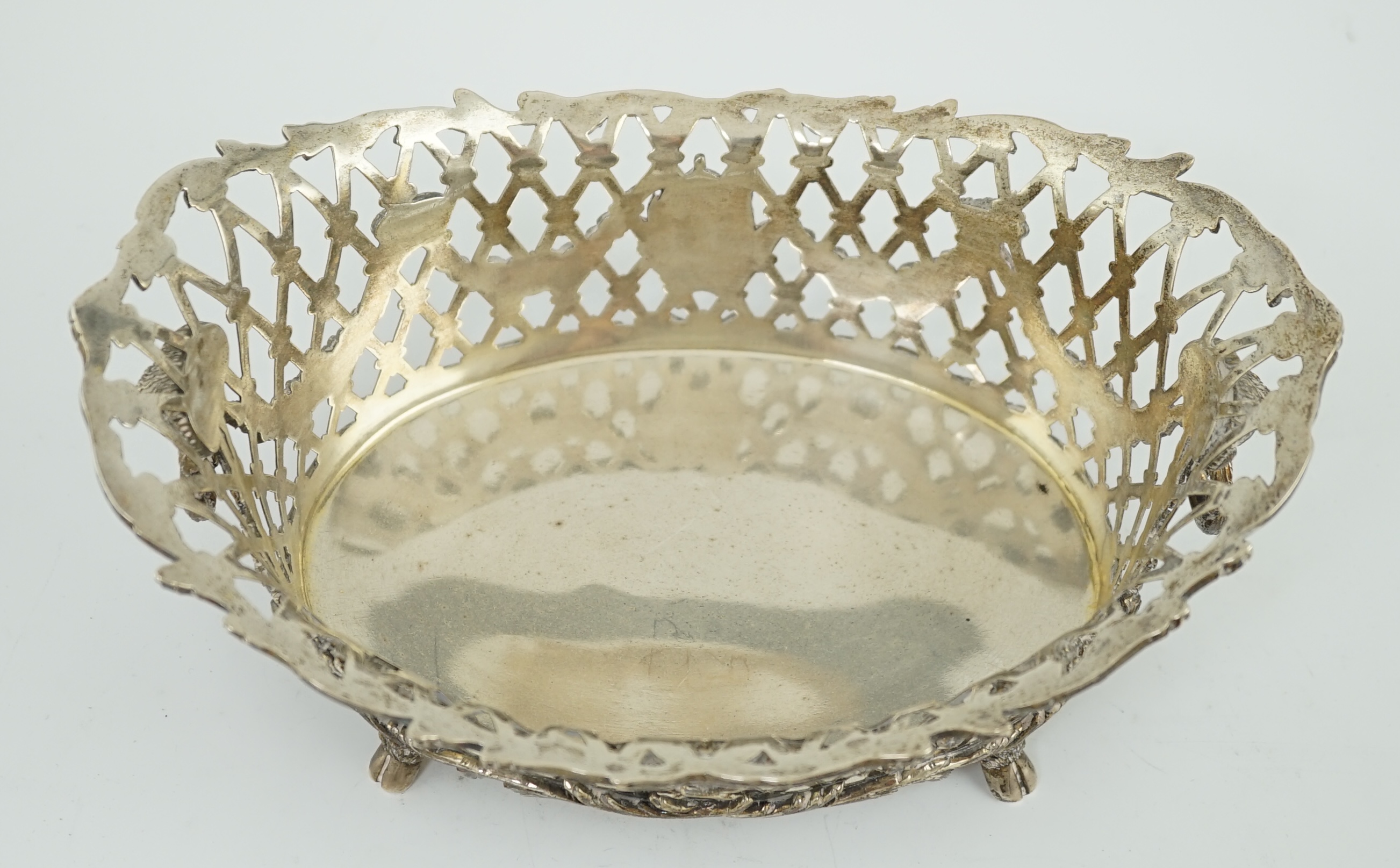 A late Victorian pierced silver oval fruit dish, by Sydney Bellamy Harman